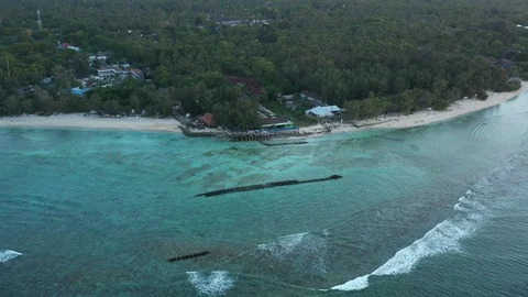 Aerial Pull Away of Waves Over Gili Trawangan Island, Indonesia Stock Footage 125845984