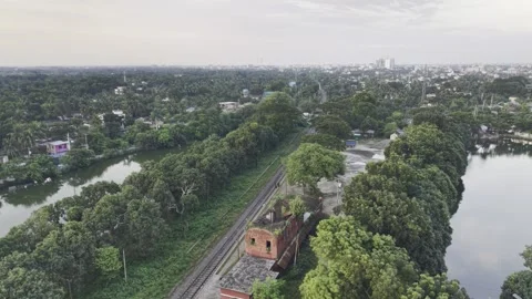 Aerial Pull-Back from Bangladesh's Historic First Railway Station in Kushtia Stock Footage 344089041