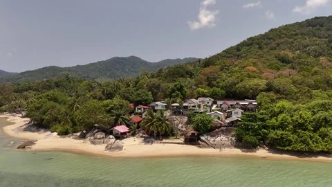 Aerial Pull Back From Beach Bungalows to Green Hills, Golden Beach Koh Phangan Stock Footage 347977984