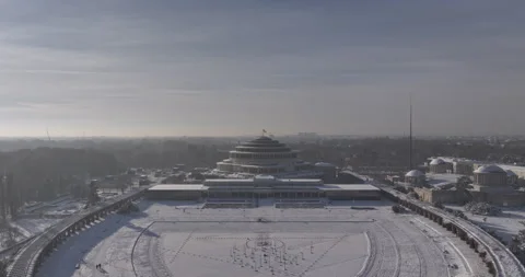 Aerial pull back from Centennial Hall and snowy Pergola in Wrocław Видео 346647566