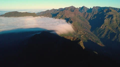 Aerial pull back from cloud waterfall and Sao Vicente valley, Madeira Vídeos de archivo 328639710