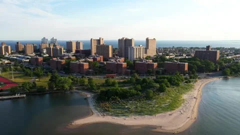 Aerial Pull back of Coney Island Creek and Apartments at Sunset Stock-Footage 337901562