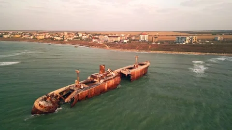 Aerial Pull Back from Evangelia Shipwreck in Costinesti Romania Stock-Footage 332512104