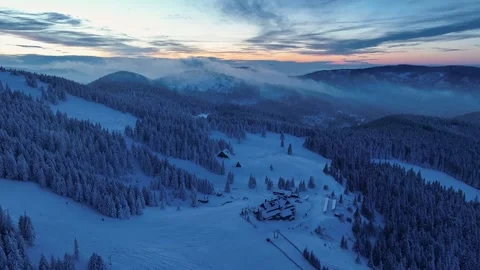 Aerial pull back from Hala Miziowa shelter during blue hour Stock Footage 336365706