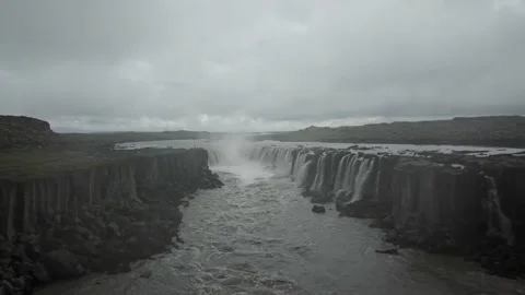 Aerial pull back from Iceland waterfall Stock Footage 167331919
