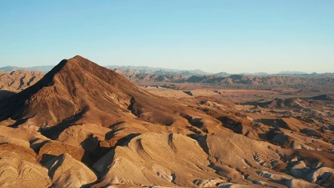 Aerial Pull Back Long Shot of Desert Volcanic Mountain near Lake Las Vegas Stock Footage 116907963