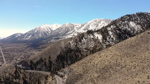 Aerial Pull Back from Mountain Highway (4k) Stock Footage 87636412