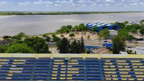 Aerial pull back movement revealing Rosario Central stadium stands Stock Footage 328668093