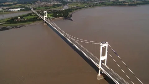 Aerial Pull Back Old Severn Bridge, Pan Round To Aust 스톡 동영상 105860283