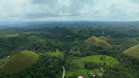 Aerial Pull-Back Over Chocolate Hills on Sunny Day in Bohol Stock Footage 333194269