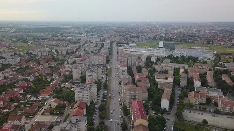Aerial Pull Back Over Straight Road Lined With Communistic Apartment Building Vídeo Stock 102443176