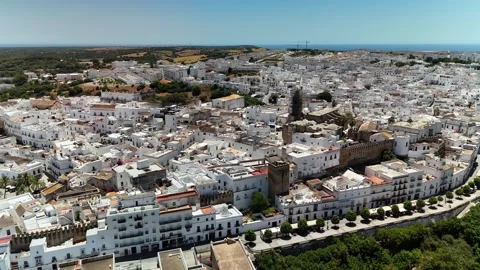 Aerial pull back over white houses in Vejer de la Frontera, Andalusia Stock Footage 339271749