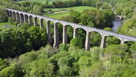 Aerial pull back from Pontcysyllte Aqueduct above the River Dee in North Wales Video stock 346228949