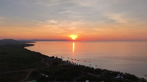 Aerial Pull-Back Reveal of Panglao Coastline at Sunrise Stock Footage 336591652