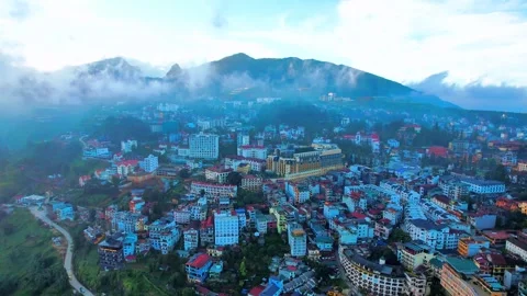 Aerial Pull-back Reveal Sapa City Through Clouds Video stock 327888100