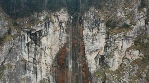 Aerial pull back revealing Skakavac waterfall near Sarajevo in dramatic canyon Stock Footage 333487976