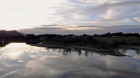 Aerial: Pull back shot of beautiful mirror lake // Allgäu, South Germany 库存影片 127773609