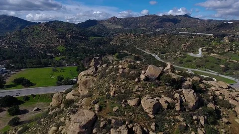 Aerial Pull Back Shot Over Mountain with Drone in 4k, 30 fps Stock Footage 72156820