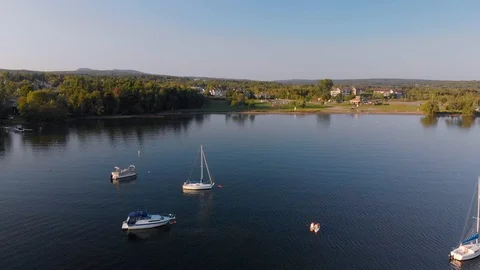 Aerial, pull back small boats at anchor, calm lake, Quebec , 4k Stock Footage 97486201