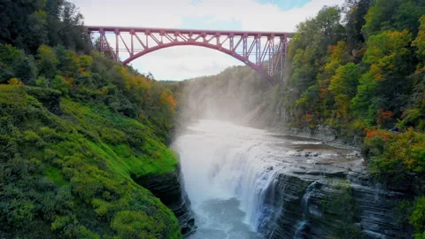 Aerial Pull Back at Upper Falls with Bridge in Letchworth State Park Stock Footage 241046267