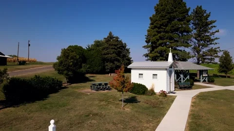 Aerial pull-back from the U.S. Center Chapel across the grass Stock-Footage 345532864