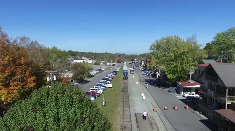 Aerial pull back video of the train arriving at downtown Blue Ridge, Georgia Stock-Footage 62469898