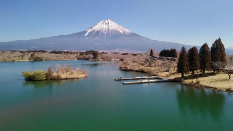 Aerial Pull Back View of Mount Fuji Across Lake Tanuki Stock Footage 336437189