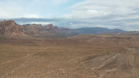 Aerial Pull Back View of Red Rock Canyon Mountains, Desert Landscape, Las Vegas Stock Footage 116649397