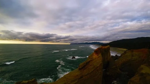 Aerial: Pull Back View Revealing Coastal Cliff Band/Great Light Stock Footage 72566892