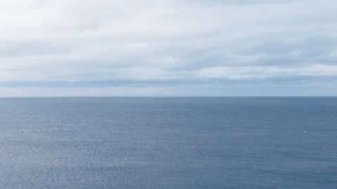 Aerial pull back view revealing a lighthouse in North Iceland Stock Footage 116861090