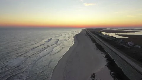 Aerial Pull Back View of Sundown at Gilgo Beach Vídeos de archivo 146104453