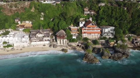 Aerial pull out along Bingin Beach coastline, Bali Stock Footage 329004880