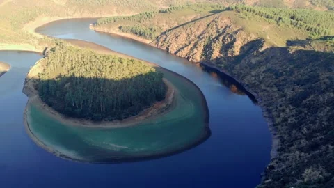 Aerial Pull Out of a beautiful river meander. Sun and Shade. 스톡 동영상 152458113