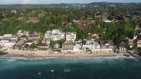 Aerial pull out from Bingin Beach cliffs, Bali 스톡 동영상 329004516