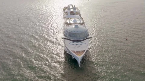 Aerial pull out front of Icon of the Seas cruise ship at sea Stock Footage 289138030