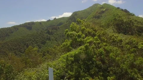 Aerial Pull Out On Holy White Cross On Wailuku Kapilau Ridge line, Maui. Stock-Footage 74116071