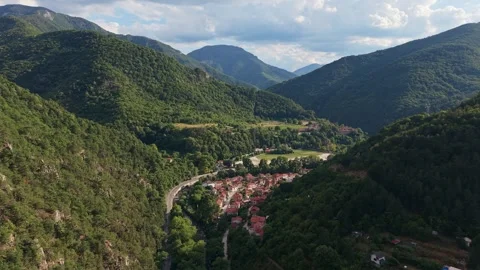 Aerial Pull Out Over Bachkovo Village in the Rhodope Mountains Bulgaria 스톡 동영상 344761918