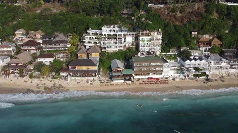 Aerial pull out over Bingin Beach ocean waves, Bali Stock Footage 329004938