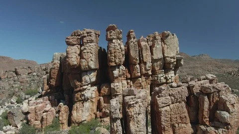 Aerial Pull Out of SciFi Rock Formation - Cederberg South Africa - Cliffs, Mars. Stock Footage 106043484