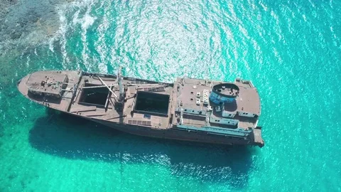 Aerial Pull Out of Shipwreck in Shallow Water 库存影片 75537188