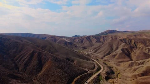 Aerial pull-out view of Calanchi del Cannizzola in the East part of Sicily Stock Footage 301316010
