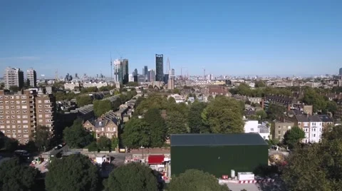 Aerial pull out view of the City of London from the South Stock Footage 68580398