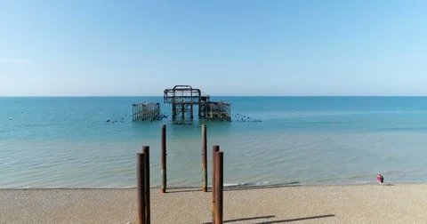 Aerial pull out view of the destroyed West Pier in Brighton Stock Footage 78605121