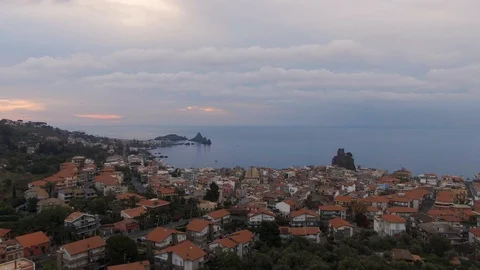 Aerial pull out view of the fishing village of Aci Castello in East Sicily Stock Footage 110802028