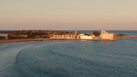 Aerial pull out view of the nature reserve of Vendicari on the coast of Sicily Stock Footage 107215935