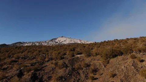 Aerial pull out view over of  the summit of mount Etna in Sicily (Italy) Stock Footage 104125016