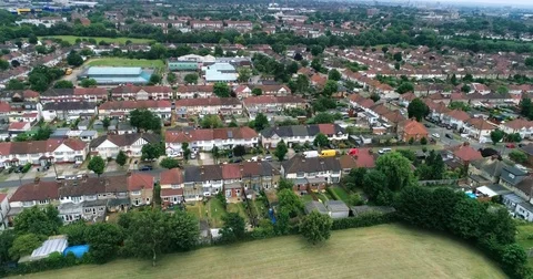 Aerial pull out view of suburban areas in North London (Wembley) Stock Footage 77150465