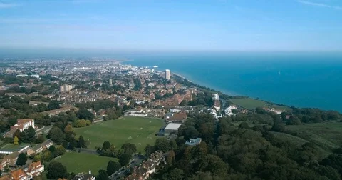 Aerial pull out view of the town of Eastbourne, Southern England Stock Footage 80875664