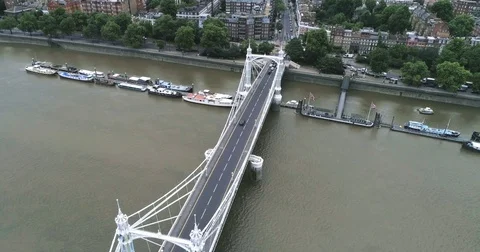 Aerial pull out view of the victorian Albert bridge in West London Stock Footage 77567605