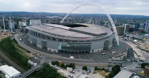 Aerial pull out view of Wembley stadium in North London Stock Footage 77151266